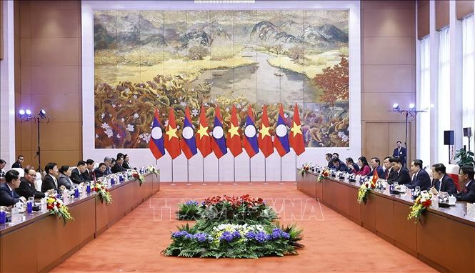 Chủ tịch Quốc hội Trần Thanh Mẫn hội kiến Tổng Bí thư, Chủ tịch nước Lào Thongloun Sisoulith. Ảnh: Doãn Tấn – TTXVN