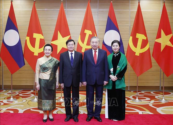 General Secretary of the Communist Party of Vietnam Central Committee To Lam and his spouse host a state banquet in Hanoi on January 26 evening in honour of General Secretary of the Lao People’s Revolutionary Party Central Committee and President of Laos Thongloun Sisoulith and his spouse. VNA Photo: Thống Nhất