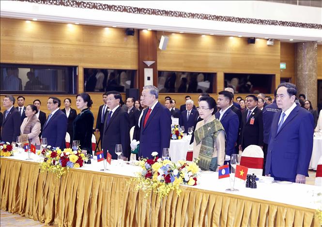 General Secretary of the Communist Party of Vietnam Central Committee To Lam and his spouse host a state banquet in Hanoi on January 26 evening in honour of General Secretary of the Lao People’s Revolutionary Party Central Committee and President of Laos Thongloun Sisoulith and his spouse. VNA Photo: Thống Nhất