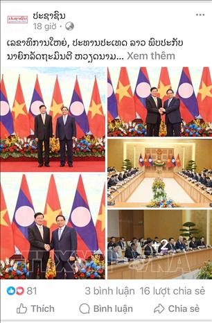 Bài viết Tổng Bí thư, Chủ tịch nước Lào gặp Thủ tướng Phạm Minh Chính trên báo Pasaxon. Ảnh: Xuân Tú - PV TTXVN tại Lào