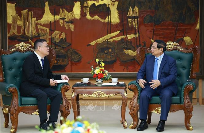 Thủ tướng Phạm Minh Chính tiếp ông Hồng Thiên Chúc, Chủ tịch Tập đoàn Texhong (Trung Quốc). Ảnh: Dương Giang-TTXVN 
