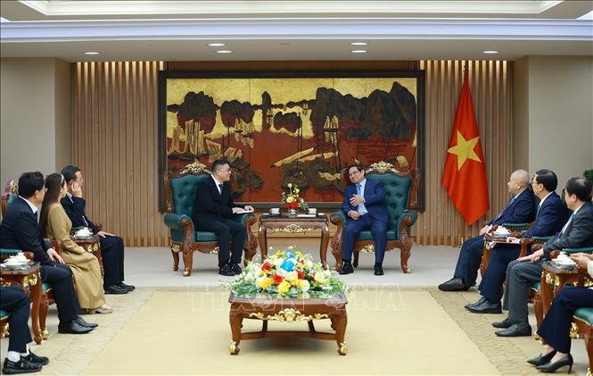 Thủ tướng Phạm Minh Chính tiếp ông Hồng Thiên Chúc, Chủ tịch Tập đoàn Texhong (Trung Quốc). Ảnh: Dương Giang-TTXVN 
