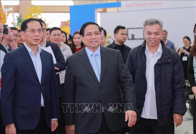 Prime Minister Pham Minh Chinh attends the general rehearsal for the opening ceremony of the first Spring Fair 2026 at the Vietnam Exposition Centre in Hanoi on February 1. VNA Photo: Phan Phương