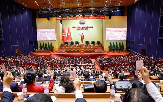 Thành công của Đại hội Đảng toàn quốc lần thứ XIV đã mang đến niềm tin và kỳ vọng lớn cho toàn dân tộc. Trong ảnh: Đại biểu biểu quyết thông qua danh sách bầu Ban chấp hành Trung ương Đảng khóa XIV (Hà Nội, 22/1/2026). Ảnh: TTXVN