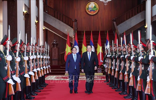  Thủ tướng Phạm Minh Chính gặp Thủ tướng Lào Sonexay Siphandone. Ảnh: Dương Giang-TTXVN
