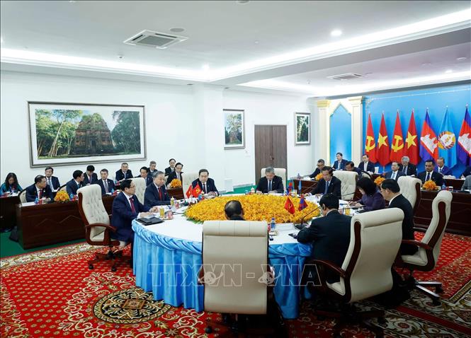 Cuộc gặp cấp cao giữa 3 đảng: Đảng Nhân dân Campuchia, Đảng Cộng sản Việt Nam và Đảng Nhân dân Cách mạng Lào. Ảnh: Thống Nhất – TTXVN