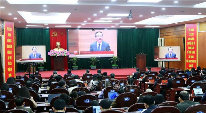 Đại biểu tại điểm cầu Trung tâm Hội nghị tỉnh Sơn La, kết nối trực tuyến đến hội nghị toàn quốc nghiên cứu, học tập, quán triệt và triển khai thực hiện Nghị quyết Đại hội XIV của Đảng. Ảnh: Quang Quyết - TTXVN