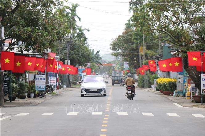Xã An Phú được trang hoàng chuẩn bị cho ngày bầu cử. Ảnh: Phạm Cường-TTXVN