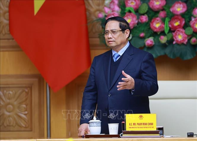 Prime Minister Pham Minh Chinh hosts a delegation of leaders from 37 JCCI member companies led by Keita Ishii, Chairman of the Japan–Mekong Economic Committee and Chairman and CEO of Itochu Corporation, on February 9. VNA Photo: Dương Giang