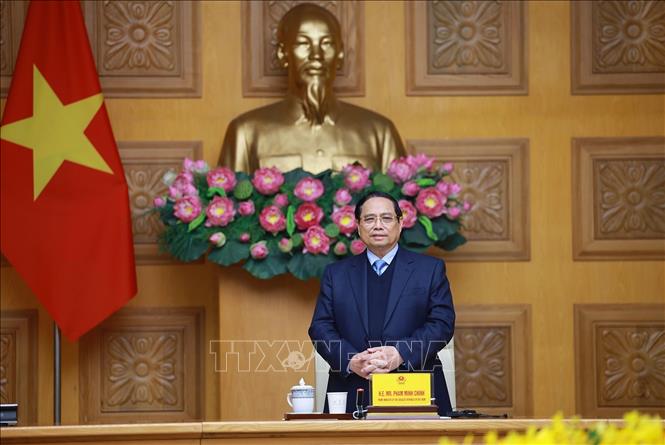 Prime Minister Pham Minh Chinh hosts a delegation of leaders from 37 JCCI member companies led by Keita Ishii, Chairman of the Japan–Mekong Economic Committee and Chairman and CEO of Itochu Corporation, on February 9. VNA Photo: Dương Giang