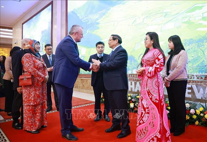 Prime Minister Pham Minh Chinh and his spouse host a banquet in Hanoi on February 9 evening for the diplomatic corps, ahead of the upcoming Lunar New Year. VNA Photo: Dương Giang