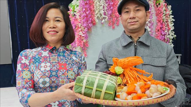 Cuộc thi gói bánh chưng tại Upha. Ảnh: Tâm Hằng - TTXVN tại LB Nga