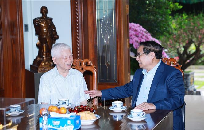  Thủ tướng Phạm Minh Chính chúc Tết đồng chí Nguyễn Minh Triết, nguyên Chủ tịch nước. Ảnh: Dương Giang-TTXVN 