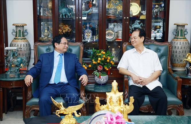 Thủ tướng Phạm Minh Chính chúc Tết gia đình đồng chí Nguyễn Tấn Dũng, nguyên Thủ tướng Chính phủ. Ảnh: Dương Giang-TTXVN 