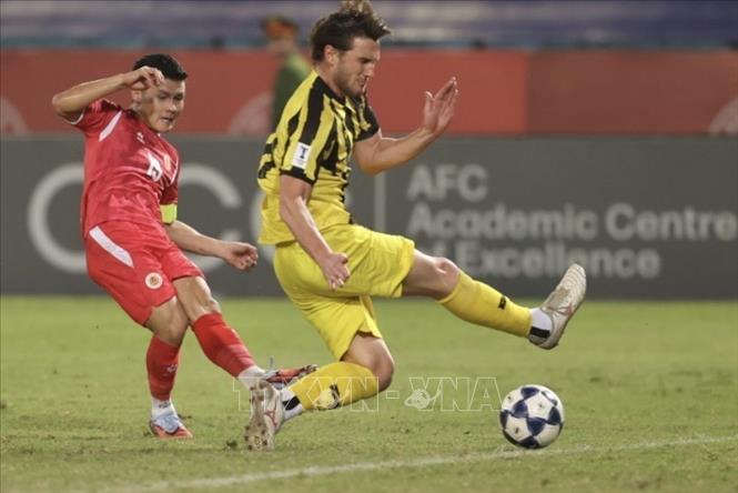 Quang Hải dứt điểm cận thành mở tỷ số cho CLB CAHN. Ảnh: Minh Quyết - TTXVN