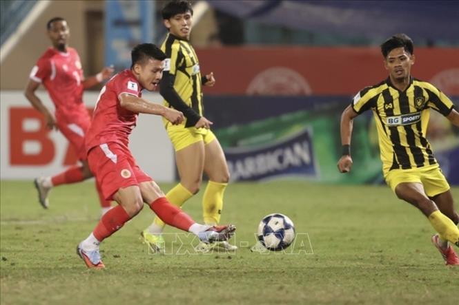 Quang Hải hoàn tất cú đúp trong trận đấu. Ảnh: Minh Quyết - TTXVN