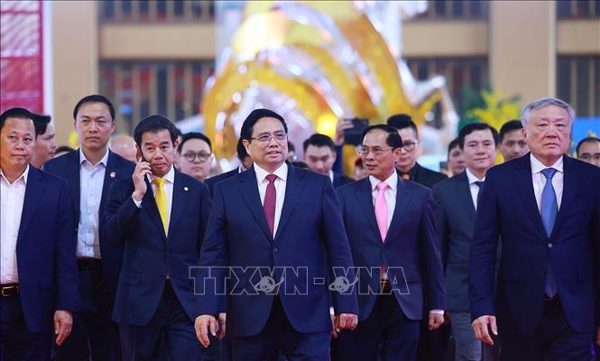 Thủ tướng Phạm Minh Chính đến dự Lễ bế mạc Hội chợ mùa Xuân lần thứ nhất - năm 2026. Ảnh: Dương Giang-TTXVN
