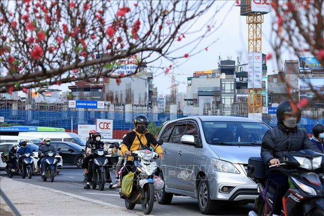 Người dân tiếp tục trở về quê để đoàn tụ gia đình trong dịp Tết đến Xuân về. Ảnh: Tuấn Anh - TTXVN