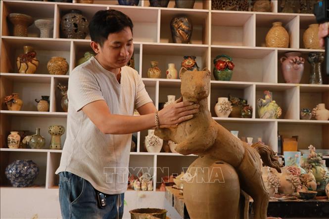 This year’s horses are chubby with short legs, exuding an aristocratic charm, symbolising accumulation and ease. VNA Photo: Khoa Chương