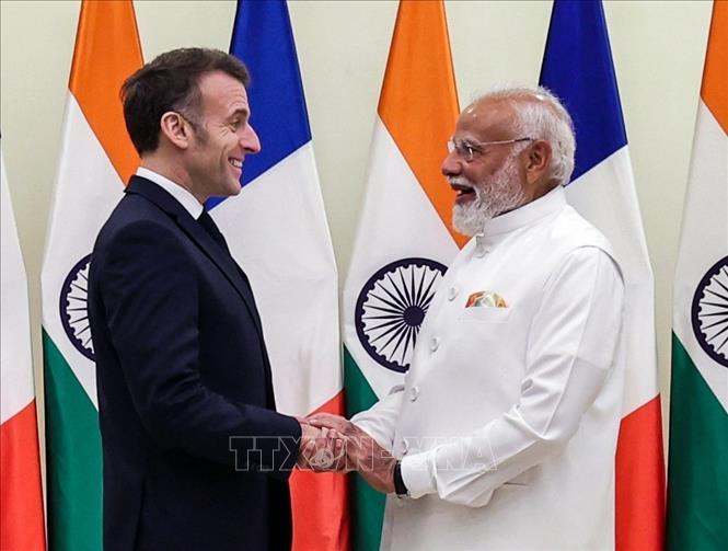 Thủ tướng Ấn Độ Narendra Modi và Tổng thống Pháp Emmanuel Macron tại cuộc gặp ở Mumbai ngày 17/2/2026. Ảnh: ANI/TTXVN