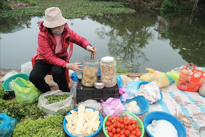 Chợ Đình Cả mỗi năm chỉ họp một phiên vào mùng 2 Tết. Ảnh: Minh Quyết - TTXVN