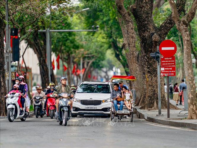 Số vụ tai nạn giảm sâu so với cùng kỳ thể hiện sự chuyển biến tích cực trong ý thức chấp hành Luật Giao thông đường bộ. Ảnh: Trung Nguyên - TTXVN