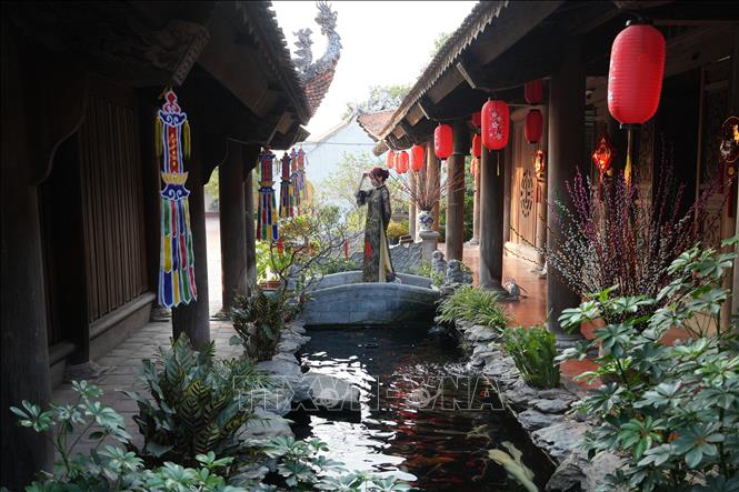 Đến chùa Ông, du khách sẽ được chiêm ngưỡng vẻ đẹp cổ xưa của ngôi chùa mang kiến trúc nghệ thuật rất công phu và độc đáo. Ảnh Mạnh Khánh-TTXVN