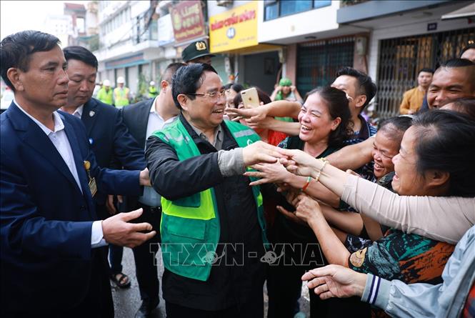 Thủ tướng Phạm Minh Chính thăm, chúc Tết nhân dân khu vực Dự án tuyến đường sắt đô thị số 3, đoạn Nhổn-Ga Hà Nội. Ảnh: Dương Giang-TTXVN