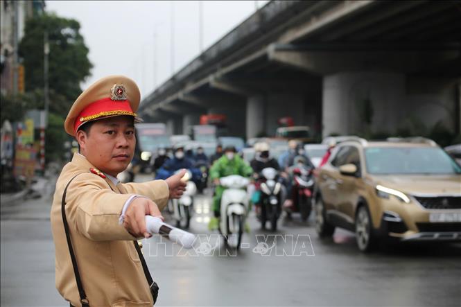 Cảnh sát giao thông Hà Nội triển khai lực lượng ở mức cao nhất. Ảnh: Quốc Lũy - TTXVN