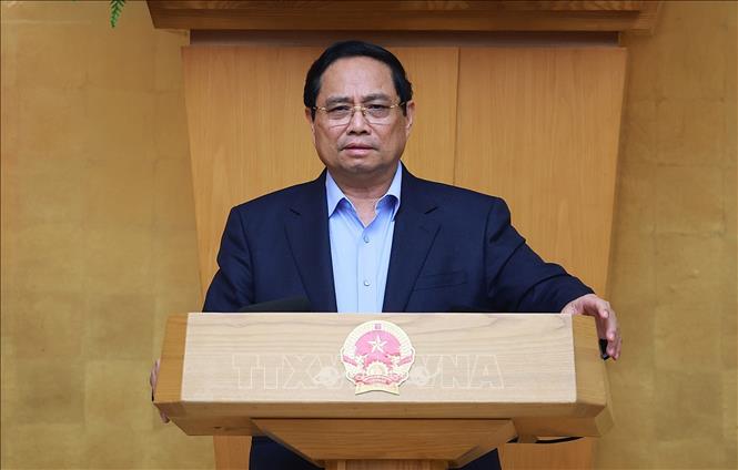 Thủ tướng Phạm Minh Chính chủ trì họp đánh giá tình hình Tết Nguyên đán Bính Ngọ. Ảnh: Dương Giang-TTXVN 
