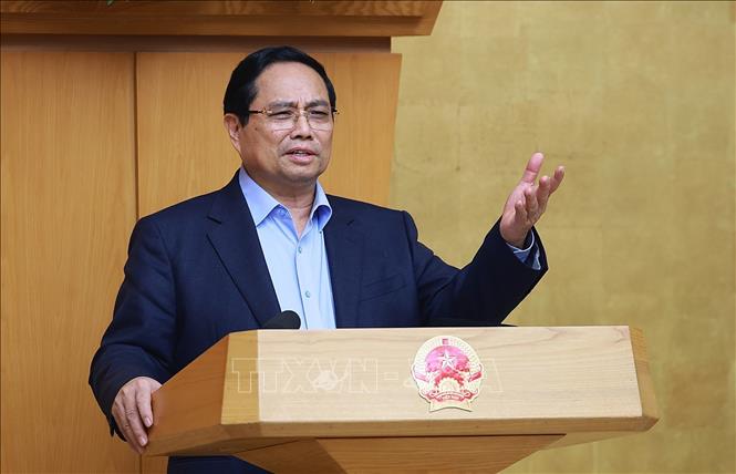 Thủ tướng Phạm Minh Chính chủ trì họp đánh giá tình hình Tết Nguyên đán Bính Ngọ. Ảnh: Dương Giang-TTXVN 
