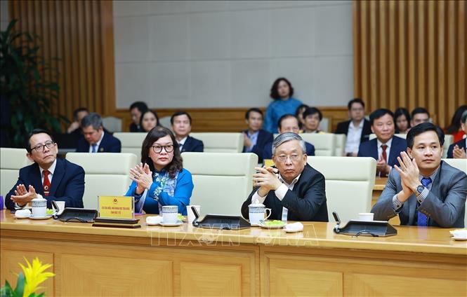 Đại diện các chuyên gia, nhà khoa học tiêu biểu trong lĩnh vực y tế tham dự buổi gặp Thủ tướng Chính phủ. Ảnh: Dương Giang-TTXVN
