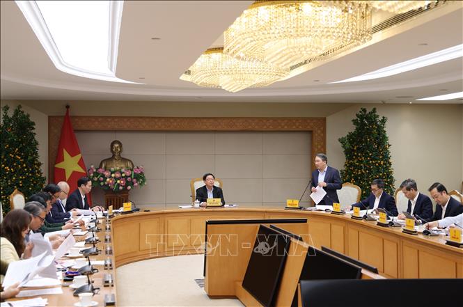 Phó Thủ tướng Hồ Quốc Dũng chủ trì cuộc họp với Bộ Tư pháp và các bộ, cơ quan liên quan về tình hình triển khai, xây dựng một số dự án luật. (Ảnh: TTXVN phát)