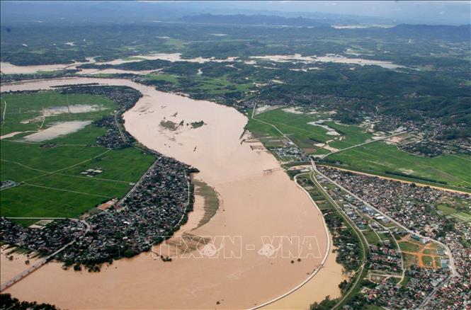 Nước trên sông Lam, Nậm Mộ, Nậm Nơn dâng cao kỷ lục khiến hàng nghìn nhà dân bị nhấn chìm trong nước. Ảnh: Văn Tý-TTXVN