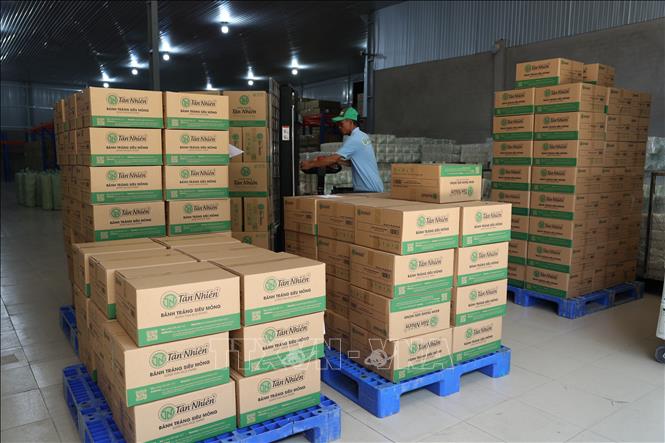 Công nhân tại Công ty TNHH Tân Nhiên (phường Long Hoa, tỉnh Tây Ninh) trở lại làm việc đầy đủ sau kỳ nghỉ Tết. Ảnh: Thanh Tân - TTXVN