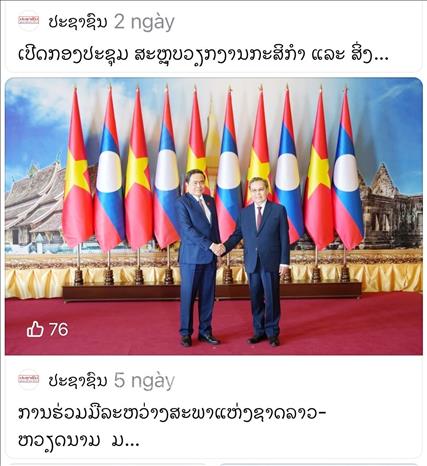 Bài viết “Hợp tác giữa Quốc hội Lào-Việt Nam hướng tới đối tác chiến lược trong giai đoạn mới” trên báo Pasaxon. Ảnh: Xuân Tú - PV TTXVN tại Lào