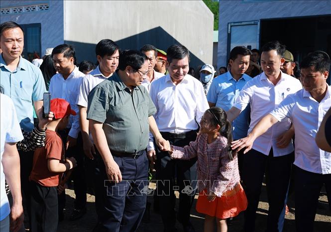 Thủ tướng Phạm Minh Chính thăm, chúc Tết nhân dân Khu Tái định cư xã Tuy An Tây, phía Đông tỉnh Đắk Lắk. Ảnh: Dương Giang-TTXVN

