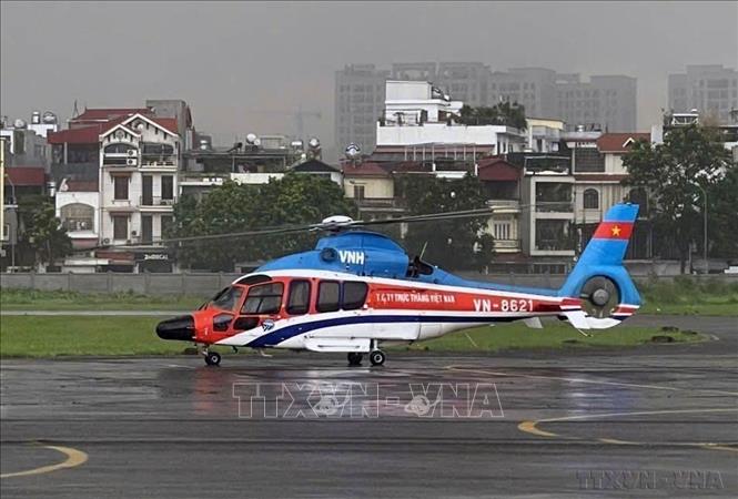 Ba trực thăng thuộc Trung đoàn Không quân 916, Sư đoàn 371 tham gia công tác cứu hộ, cứu nạn người dân vùng lũ tại tỉnh Yên Bái và Cao Bằng (11/09/2024). Ảnh: TTXVN phát