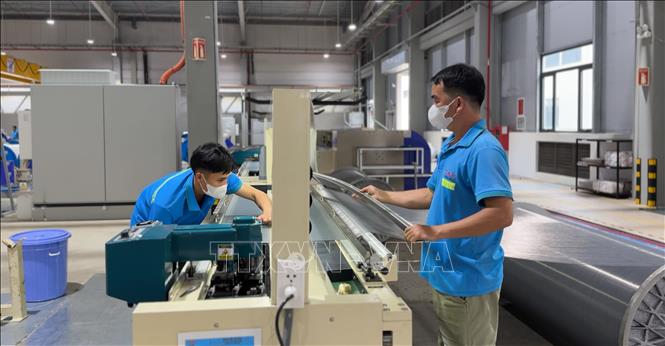 Người lao động ở Công ty TNHH PNS CHUN (KCN Vsip Tịnh Phong, Quảng Ngãi) trở lại làm việc sau kỳ nghỉ Tết Nguyên đán 2026. Ảnh: Hải Âu-TTXVN 