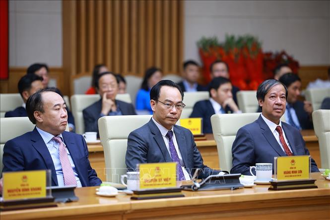 Đồng chí Hoàng Minh Sơn, Giám đốc Đại học Quốc gia Hà Nội về công tác tại Bộ Giáo dục và Đào tạo, giao Quyền Bộ trưởng Bộ Giáo dục và Đào tạo. Ảnh: Dương Giang-TTXVN 