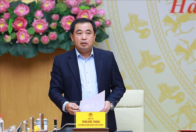 Bộ trưởng Bộ Nông nghiệp và Môi trường Trần Đức Thắng báo cáo kết quả chống khai thác hải sản bất hợp pháp, không báo cáo và không theo quy định. Ảnh: Dương Giang-TTXVN
