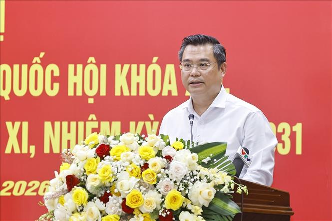 Ông Nguyễn Thanh Tùng, Ủy viên Ban Chấp hành Đảng bộ Chính phủ, Bí thư Đảng ủy, Chủ tịch HĐQT Ngân hàng TMCP Ngoại thương Việt Nam báo cáo về dự kiến chương trình hành động. Ảnh: Doãn Tấn - TTXVN