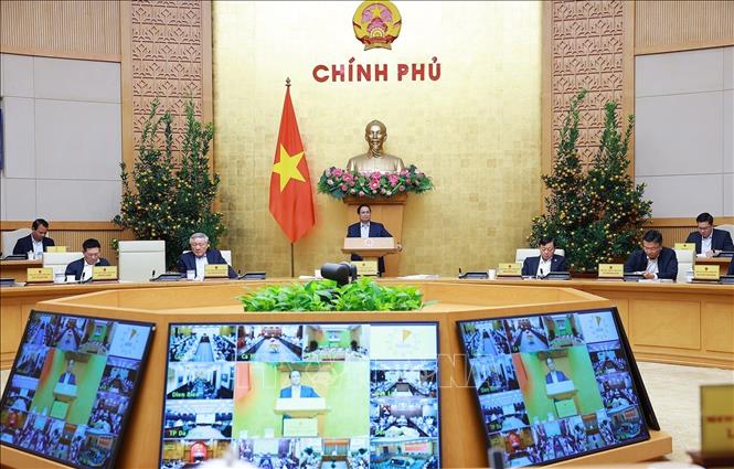Prime Minister Pham Minh Chinh chairs the Government’s regular meeting for February. VNA Photo: Dương Giang