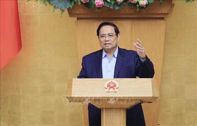 Prime Minister Pham Minh Chinh chairs the Government’s regular meeting for February. VNA Photo: Dương Giang