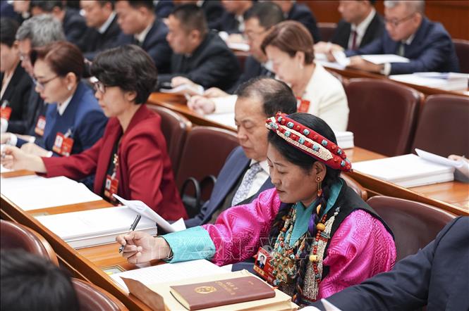 Đại biểu dự lễ khai mạc kỳ họp thứ tư Đại hội Đại biểu Nhân dân toàn quốc (Nhân đại - tức Quốc hội) Trung Quốc khóa XIV ở Bắc Kinh, ngày 5/3/2026. Ảnh: THX/TTXVN