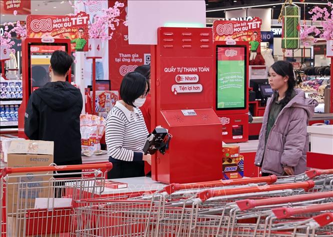 AEON, đơn vị có nhiều giải pháp trong thanh toán không dùng tiền mặt. Ảnh: Trần Việt - TTXVN