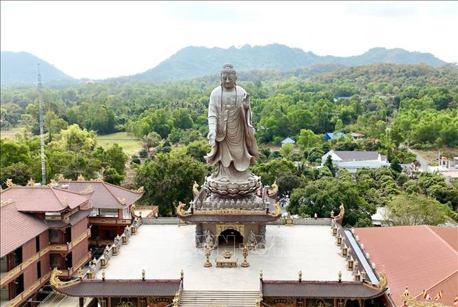The 24-metre Amitabha Buddha statue on the roof of Kim Tien Pagoda’s main hall. Photo: Thanh Sang – VNA 
