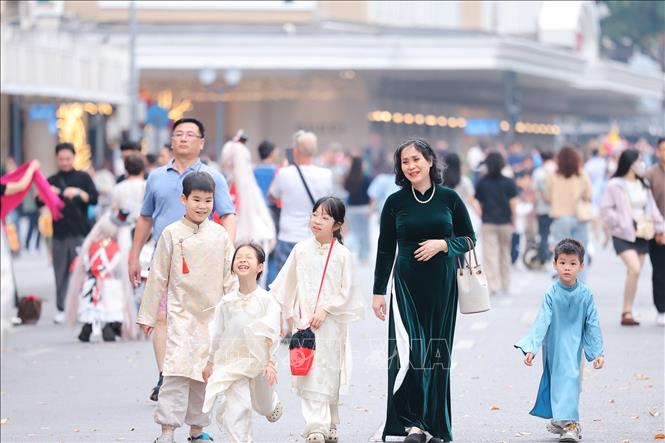 “Ao dai Week” celebrates the beauty of the traditional costume while promoting cultural values and strengthening community bonds nationwide. VNA Photo