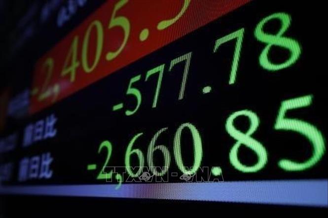 Bảng chỉ số chứng khoán tại Tokyo, Nhật Bản. Ảnh: Kyodo/TTXVN