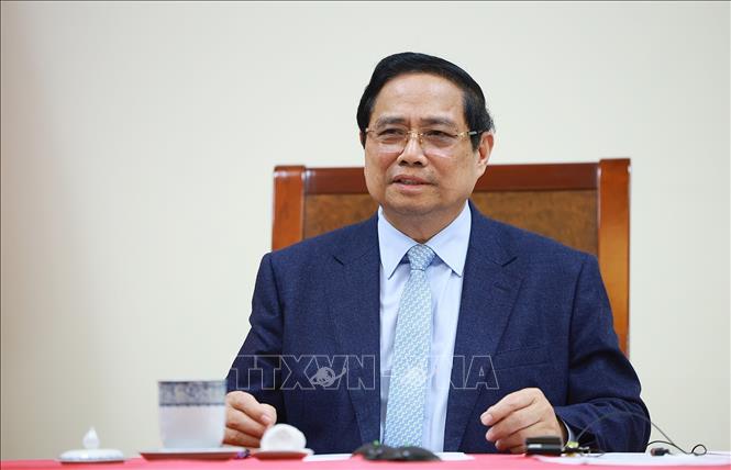 Thủ tướng Phạm Minh Chính điện đàm với Tổng thống Các Tiểu vương quốc Ả-rập thống nhất (UAE) Sheikh Mohammed bin Zayed Al-Nahyan.  Ảnh: Dương Giang-TTXVN 